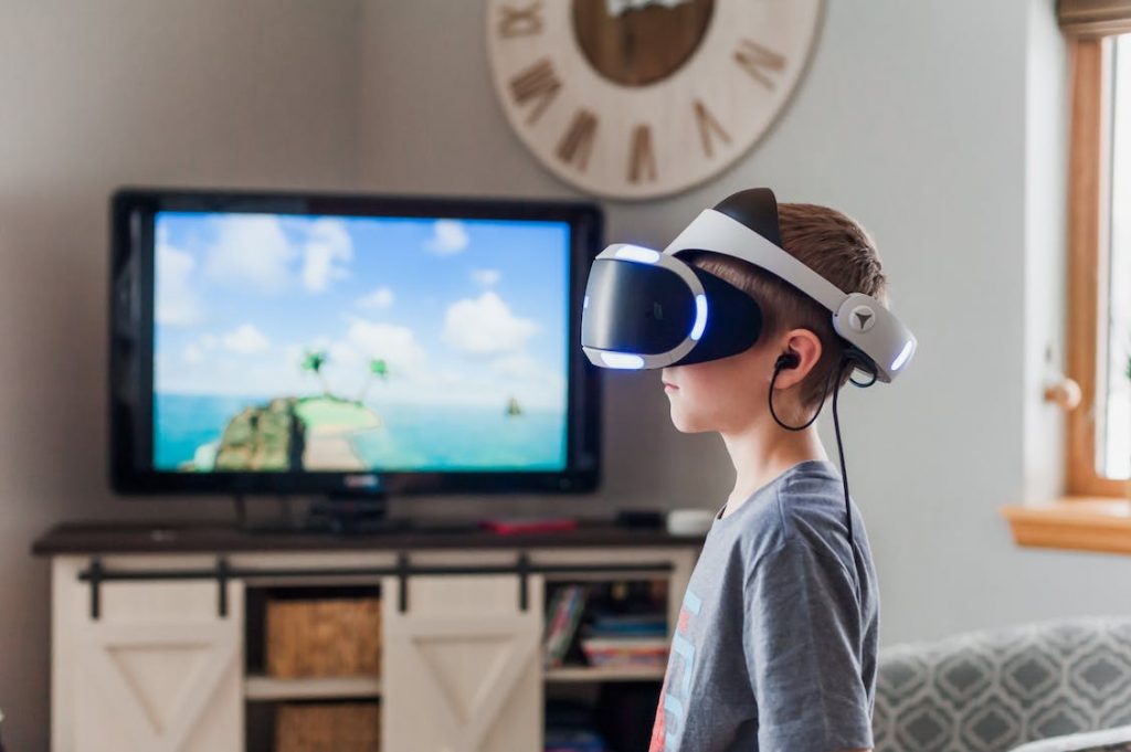 boy-wearing-a-black-and-white-virtual-reality-goggles