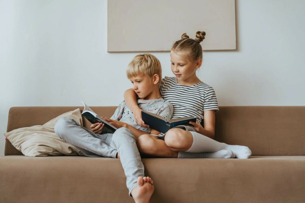 brother and sister reading books