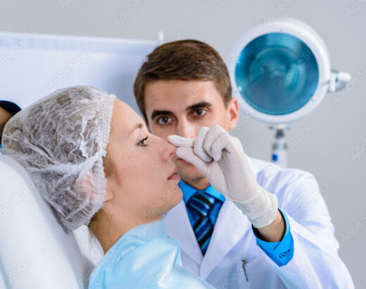 Plastic surgeon preparing for a rhinoplasty.