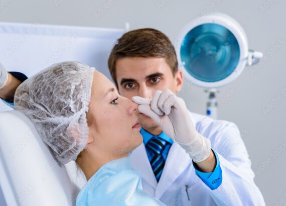 Plastic surgeon preparing for a rhinoplasty.